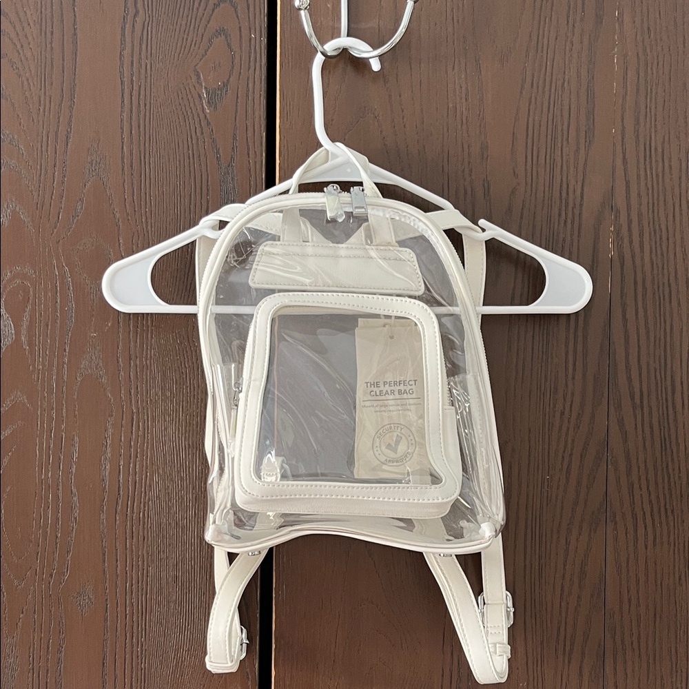 Madison West clear bag for places that require a see through bag. NWT